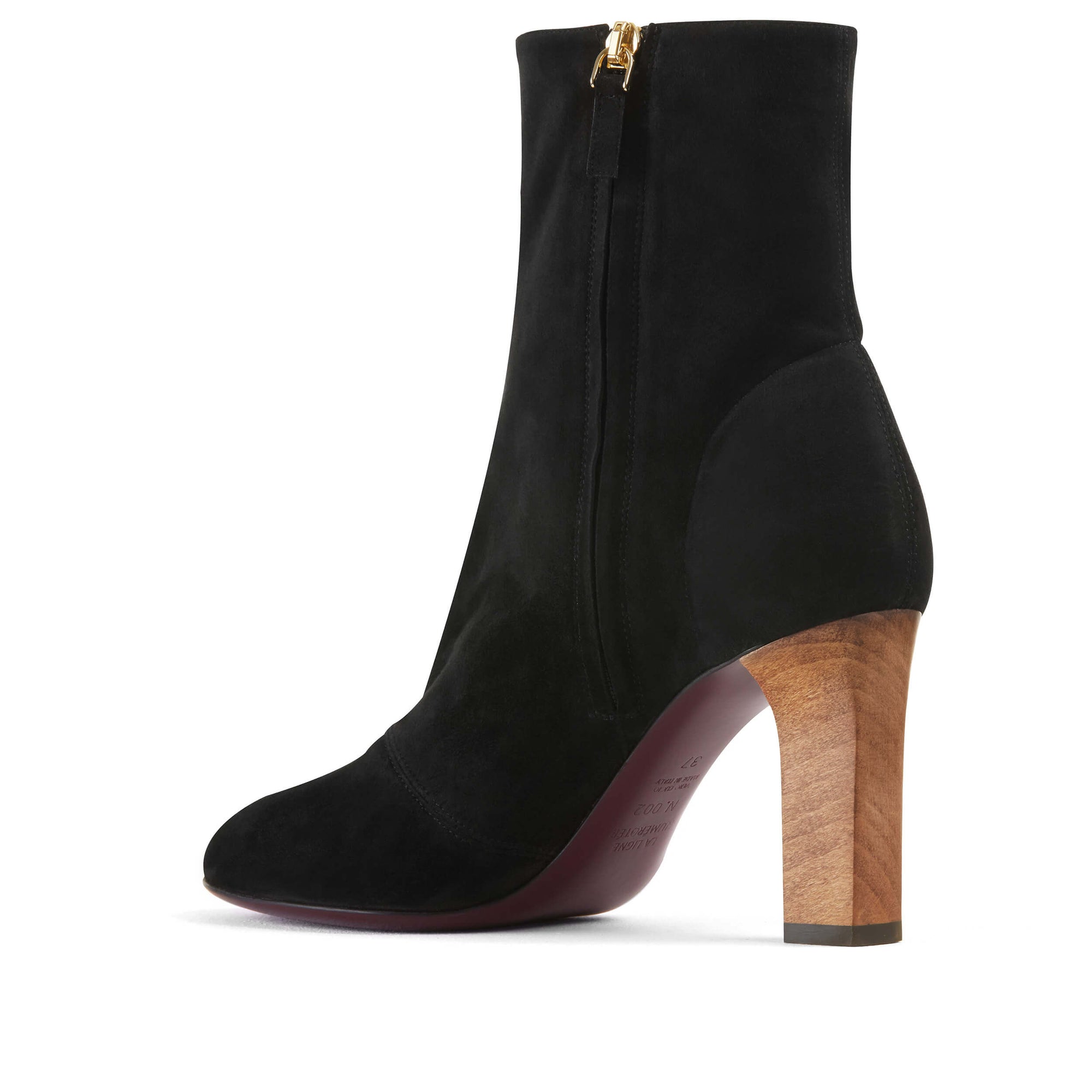 Bottine luxe made in Italy. Talon en bois de hêtre. Un modèle qui se décline en gris et bordeaux. La Ligne Numérotée