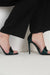 Notre sandale N.001 est portée avec un pantalon de chez Mazarine Paris. Une Edition Signature qui se décline en noir et en lin enduit pour une version plus jour. La Ligne Numérotée.